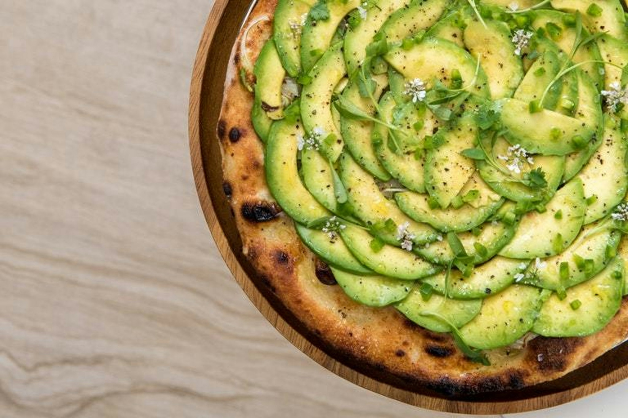 Avocado pizza at Rooftop by JG at the Waldorf Astoria Beverly Hills