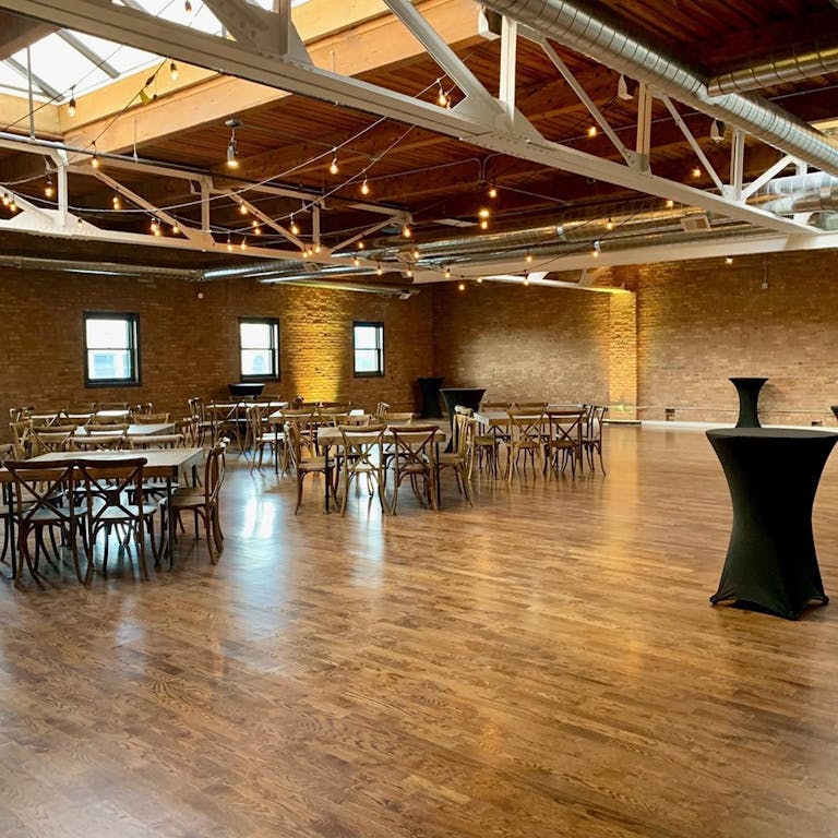 Loft space with high wooden ceiling and expose brick walls at the Zaphyr in Chicago | PartySlate