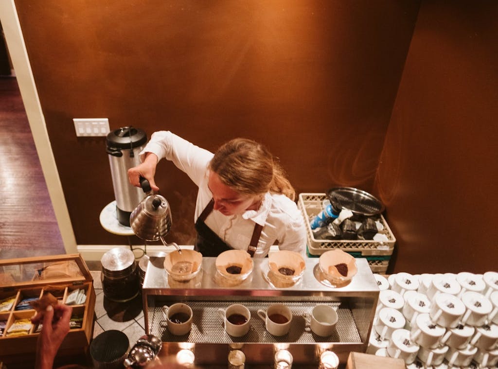 Female barista making pour-overs