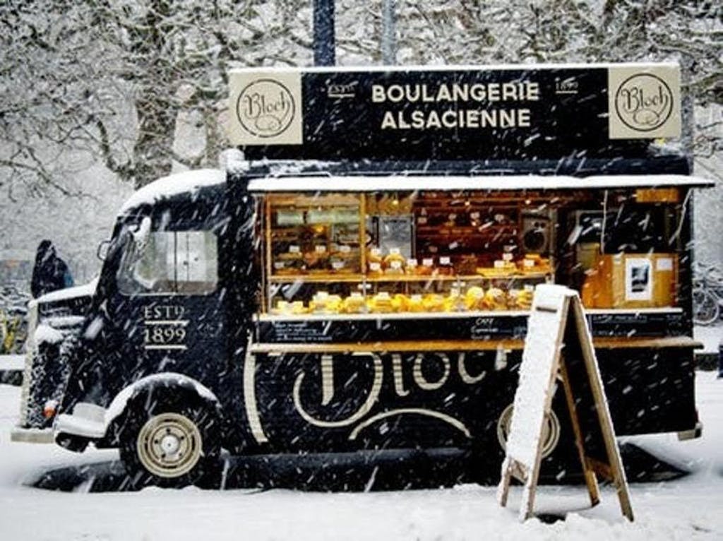 Food cart in snowy, winter scene | PartySlate