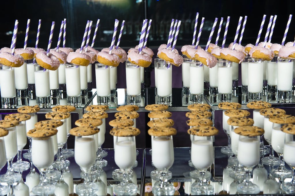 Desert station of cookies, donuts, and milk | PartySlate