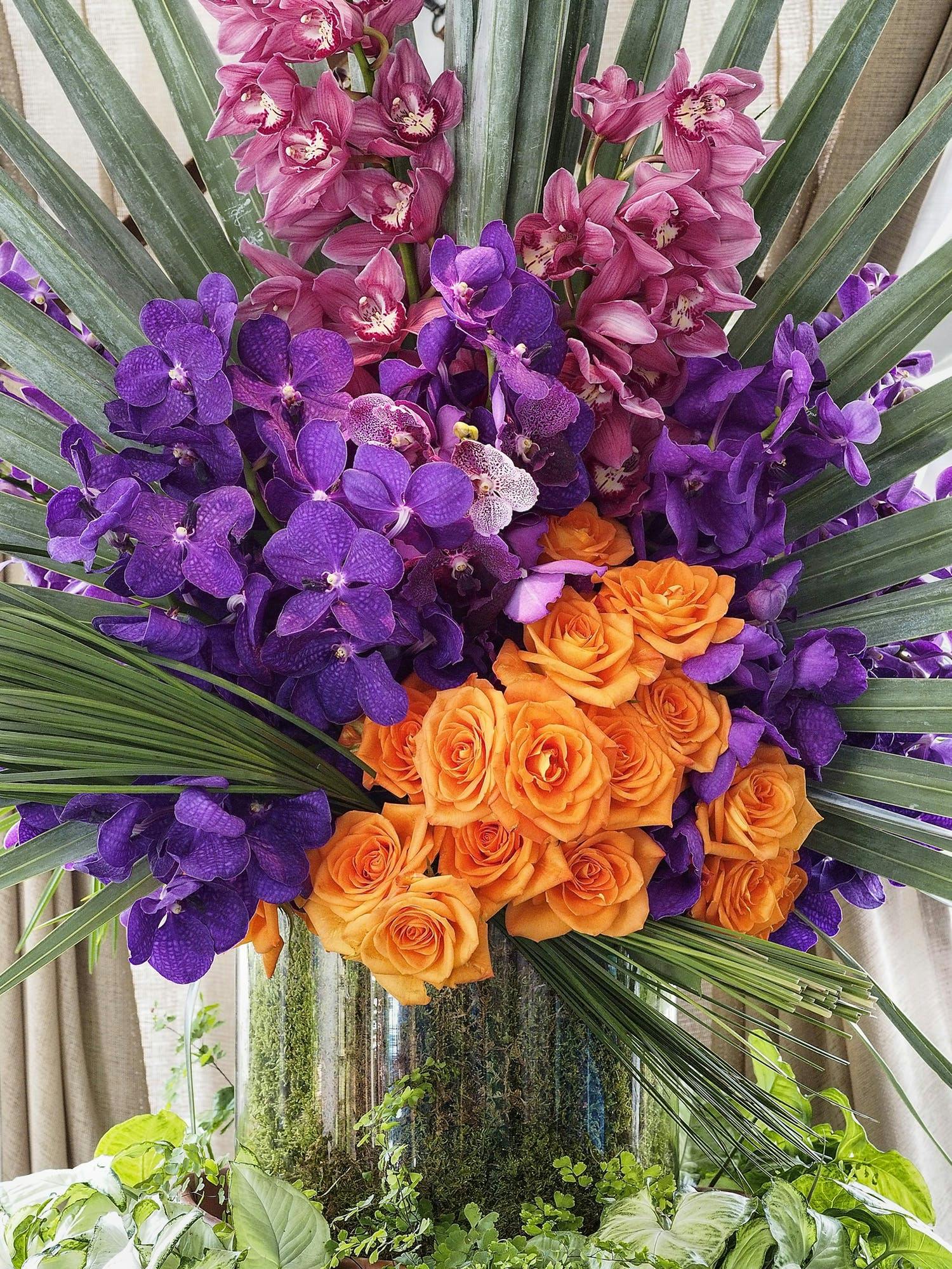 ferns and purple and orange florals