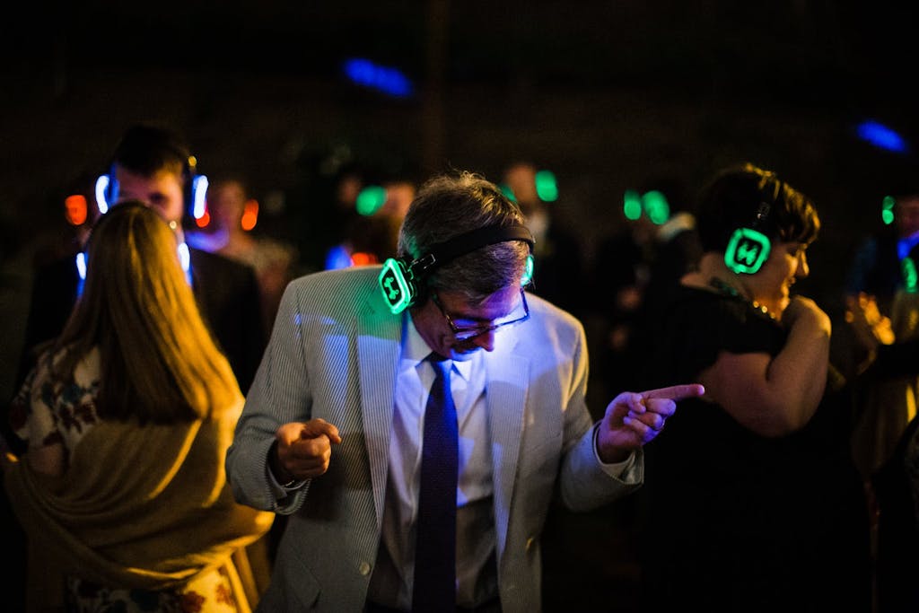 Guest dancing with glow-in-the-dark headphones