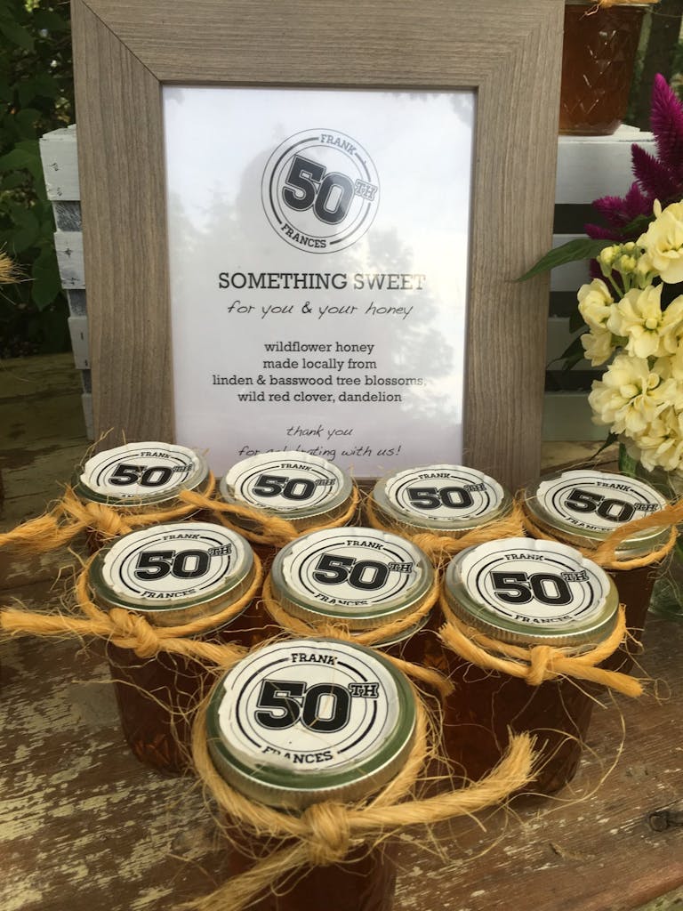 Jars of honey party favors for 50th-birthday party