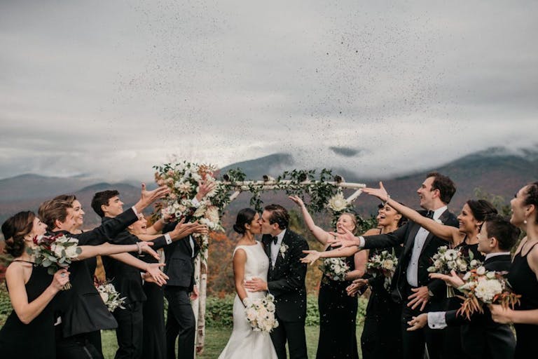 wedding party with mountainous backdrop