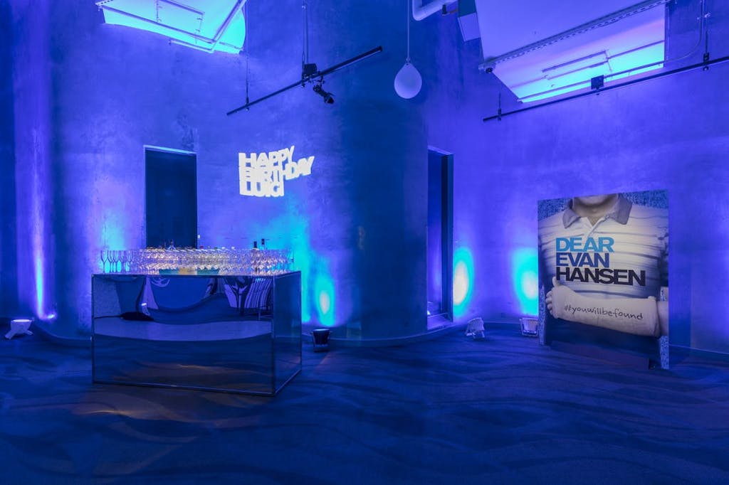 space lit glowing blue for Evan Hansen themed birthday party