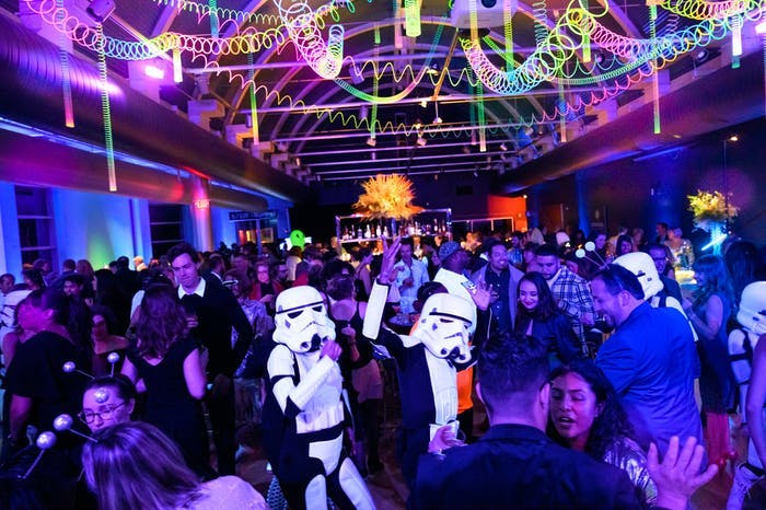 Space-Themed Party With Purple and Blue Uplighting and Storm Trooper Entertainment | PartySlate