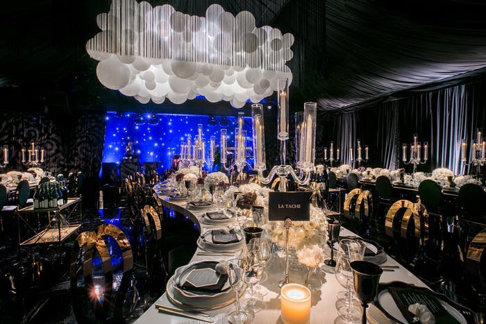 Celestial 50th Birthday Party Theme With Balloon Cloud Installation and Curving Tables | PartySlate