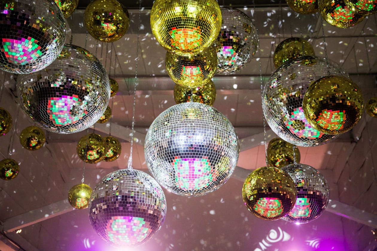Party with Disco Ball Ceiling Installation | PartySlate