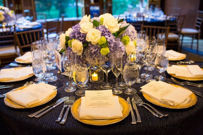 hydrangeas as centerpiece surrounded by white place settings