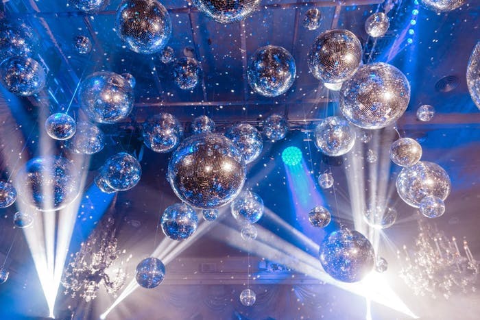 Disco-Themed Party With Disco Ball Ceiling Installation | PartySlate