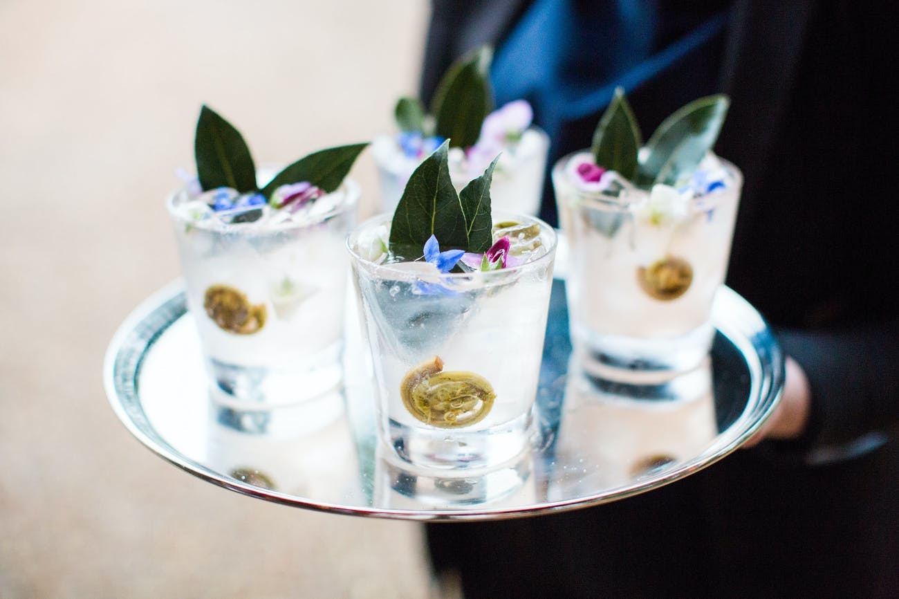 Corporate dinner party with creative cocktails featuring fiddlehead ferns | PartySlate