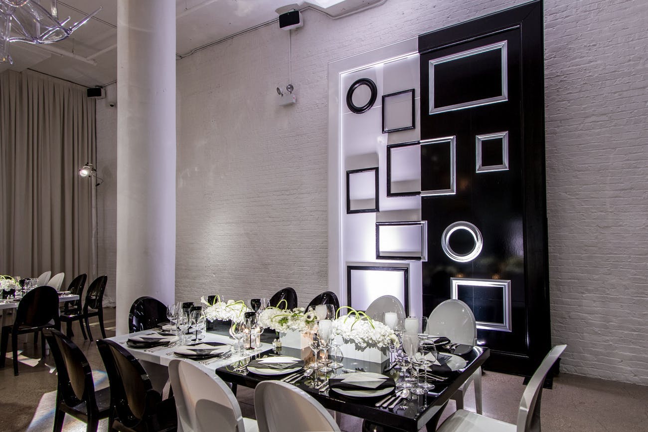 Glamorous corporate dinner party with black and white décor | PartySlate