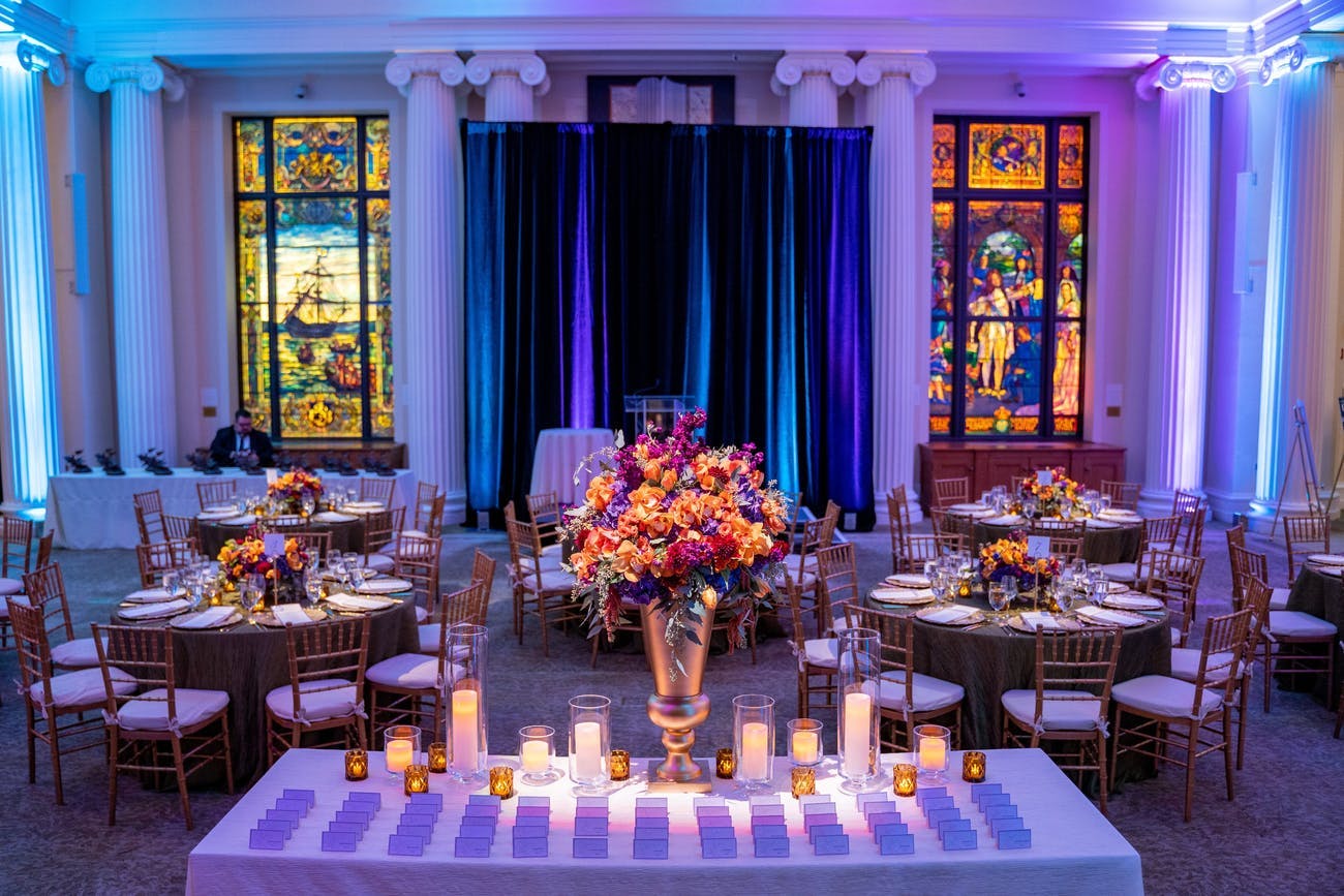 Corporate dinner party with beautiful stained glass windows | PartySlate