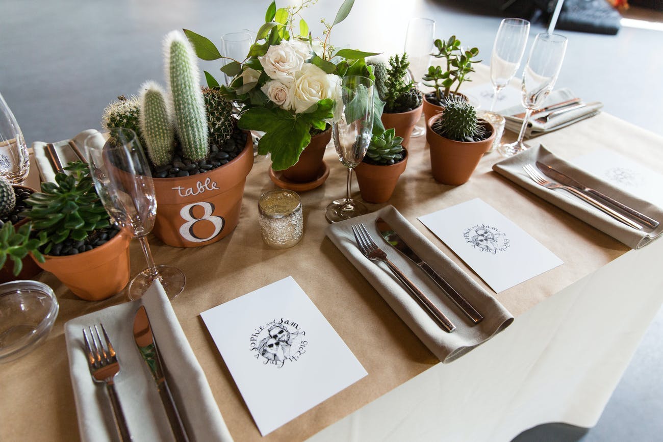 Cacti wedding centerpieces and table numbers.