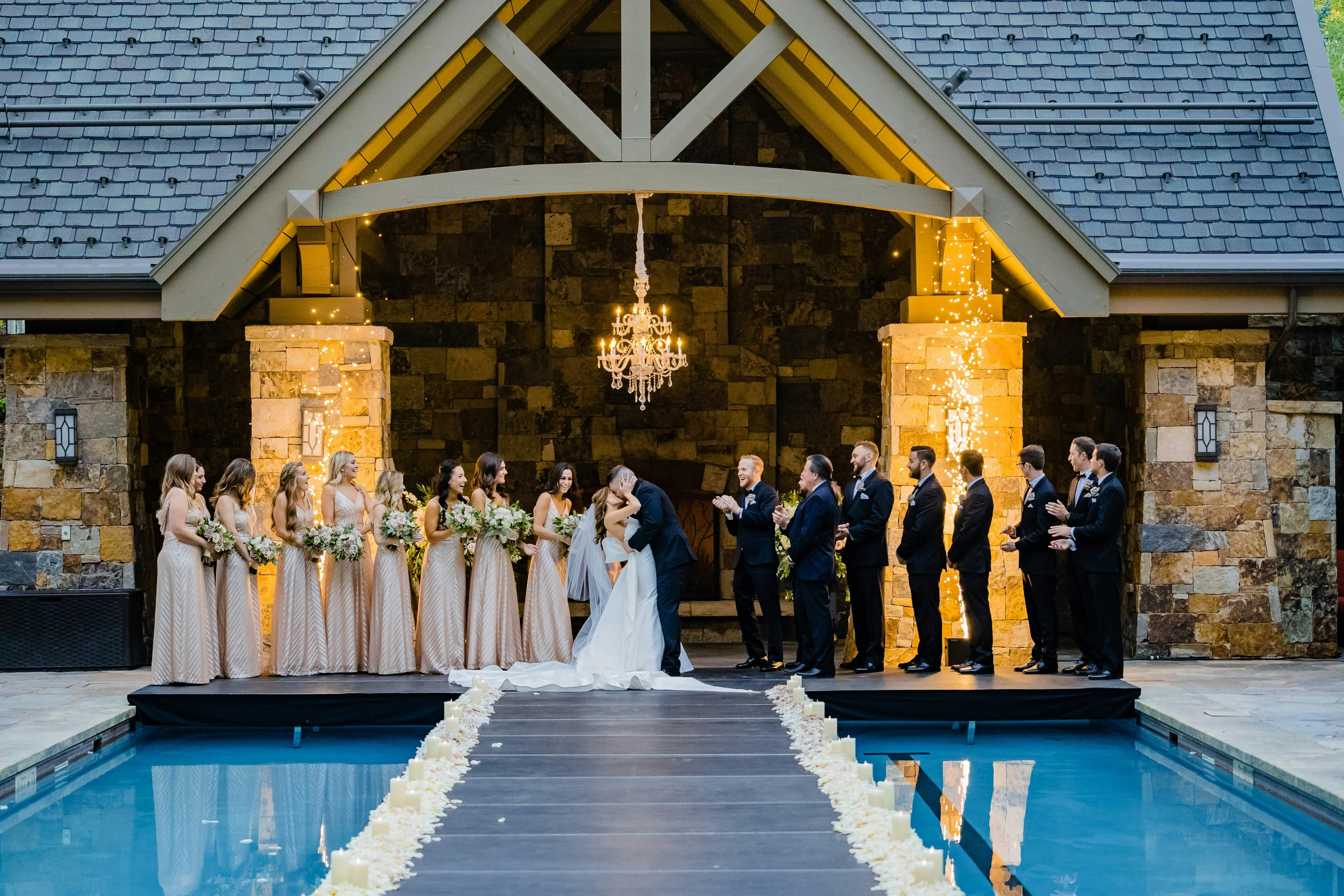Fairytale Vail Wedding With Unique Wedding Aisle Suspended Over Swimming Pool | PartySlate