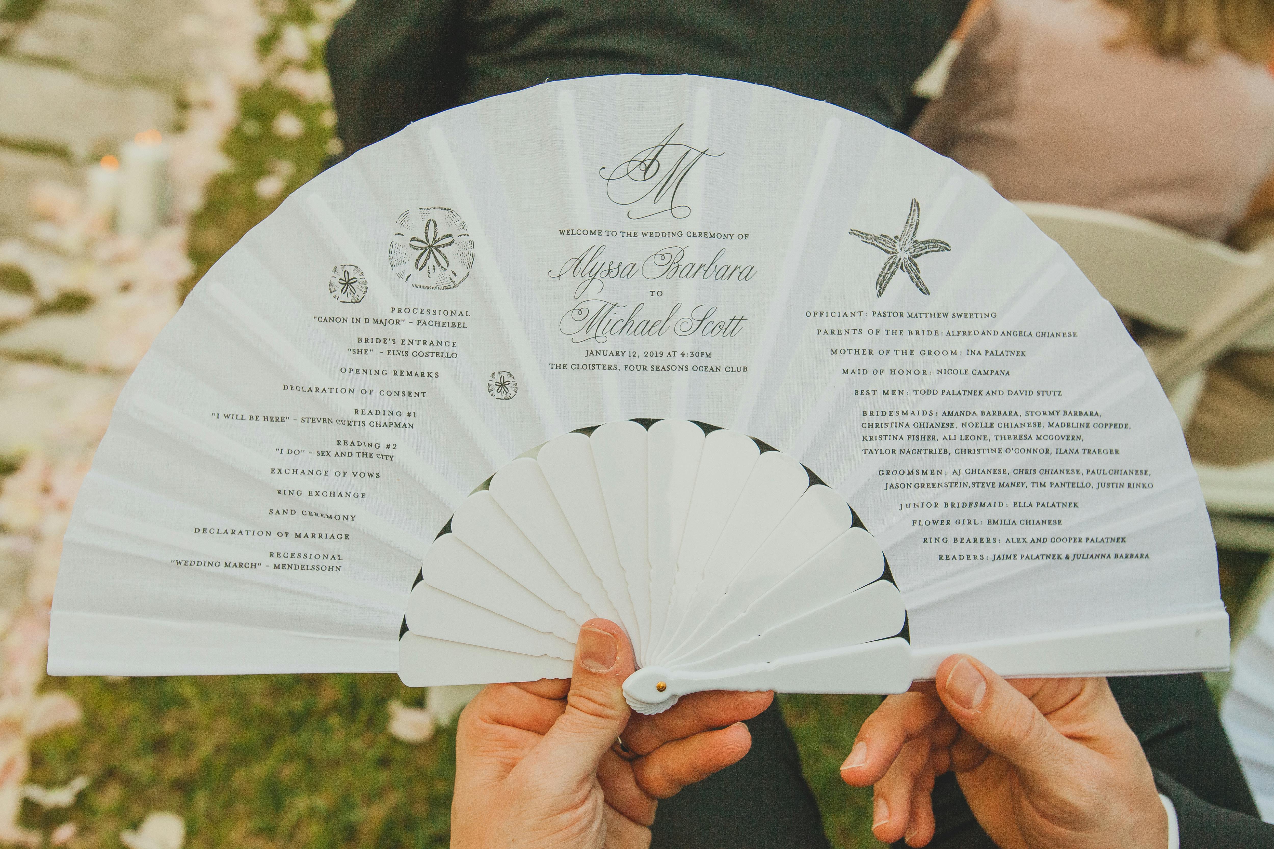Unique Wedding Ceremony Idea: Hand-Held Fan Wedding Program | PartySlate