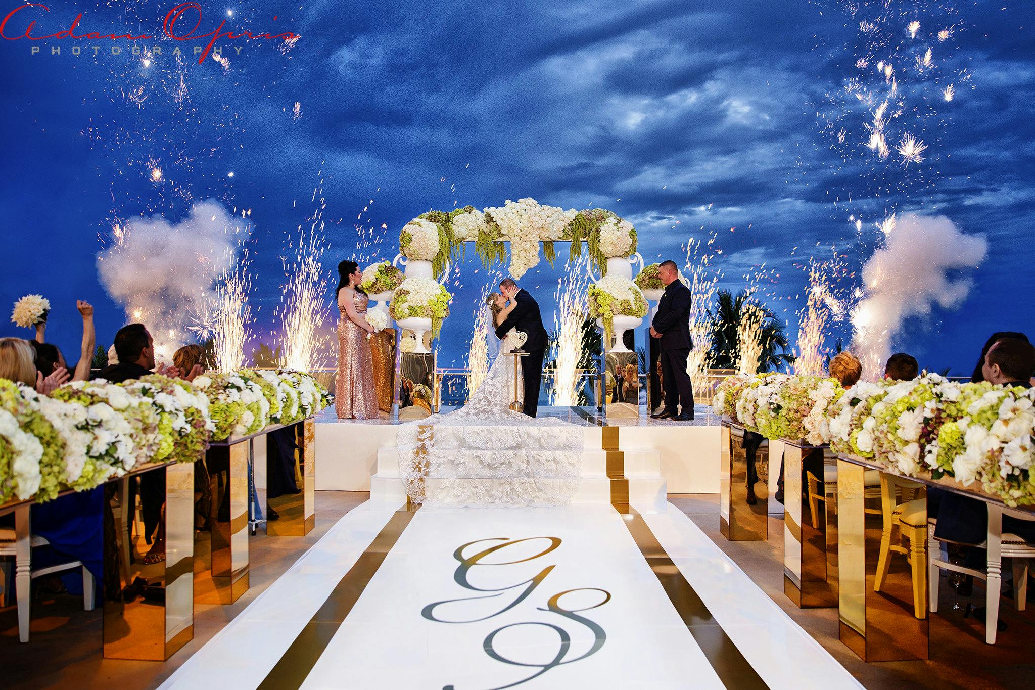 Oceanfront Wedding at Fontainebleau Miami Beach Night Time Ceremony With Cold Fireworks | PartySlate