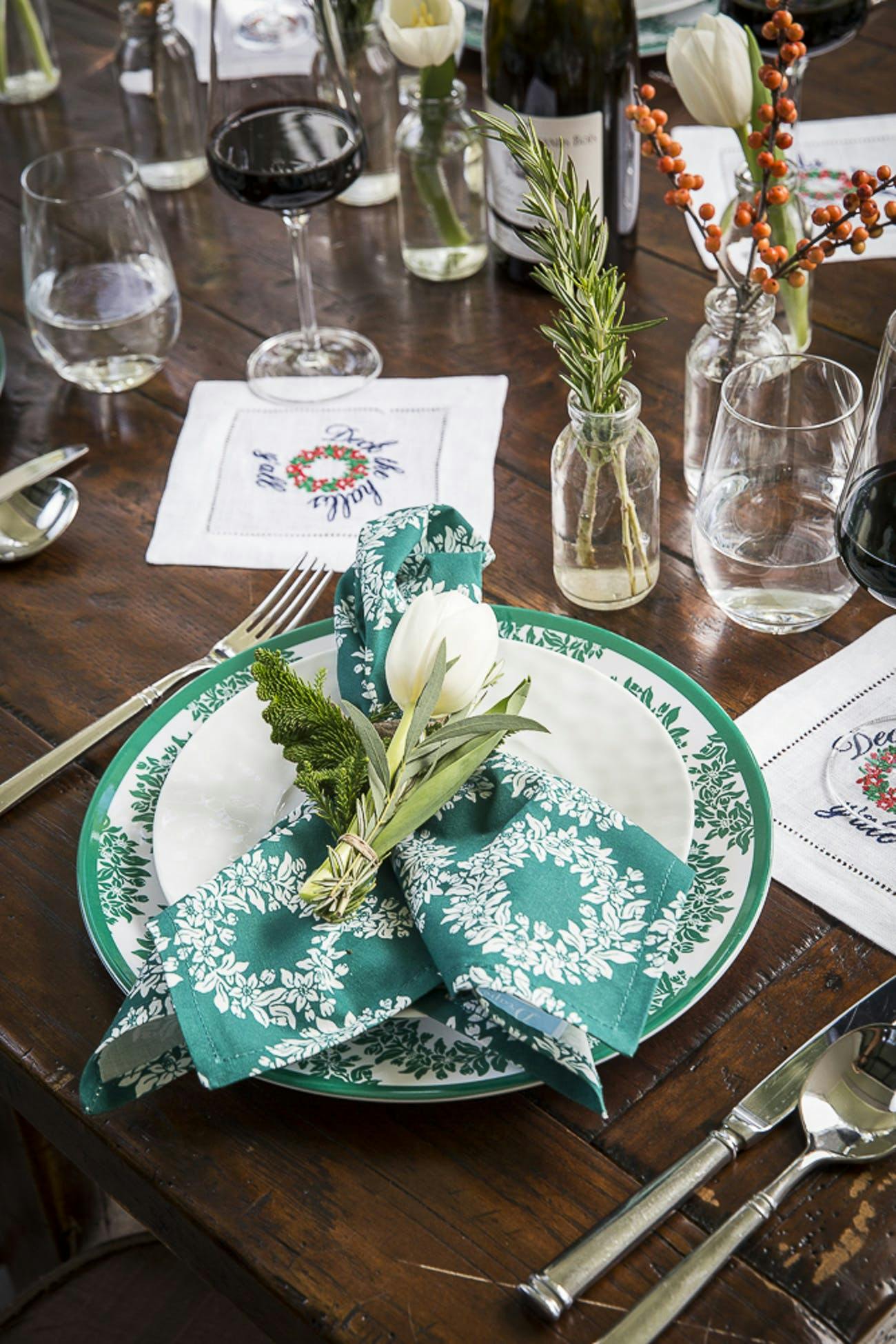 White Plate with Blue and Green Designs and a White Flower