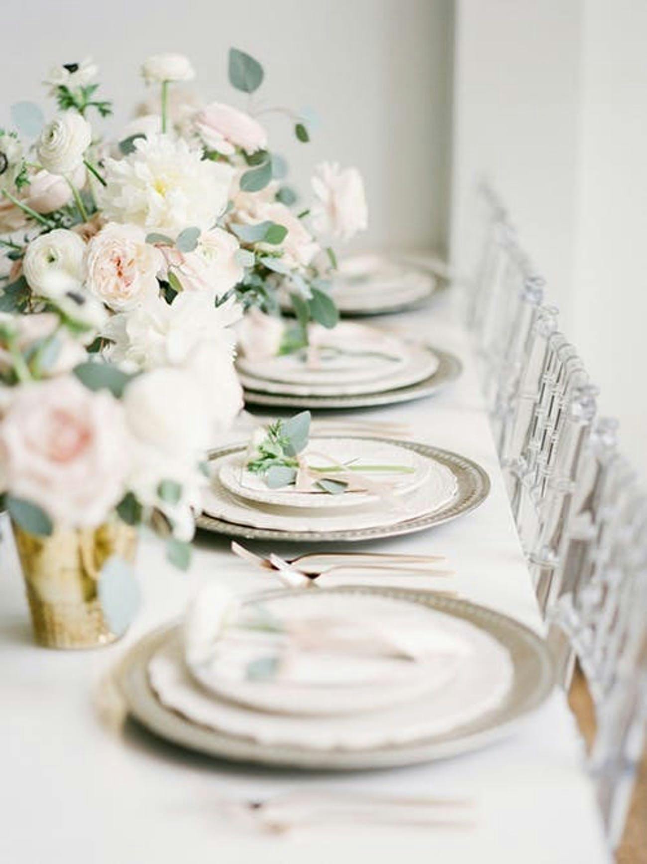 Stunning Table with Floral Centerpiece and White Plates