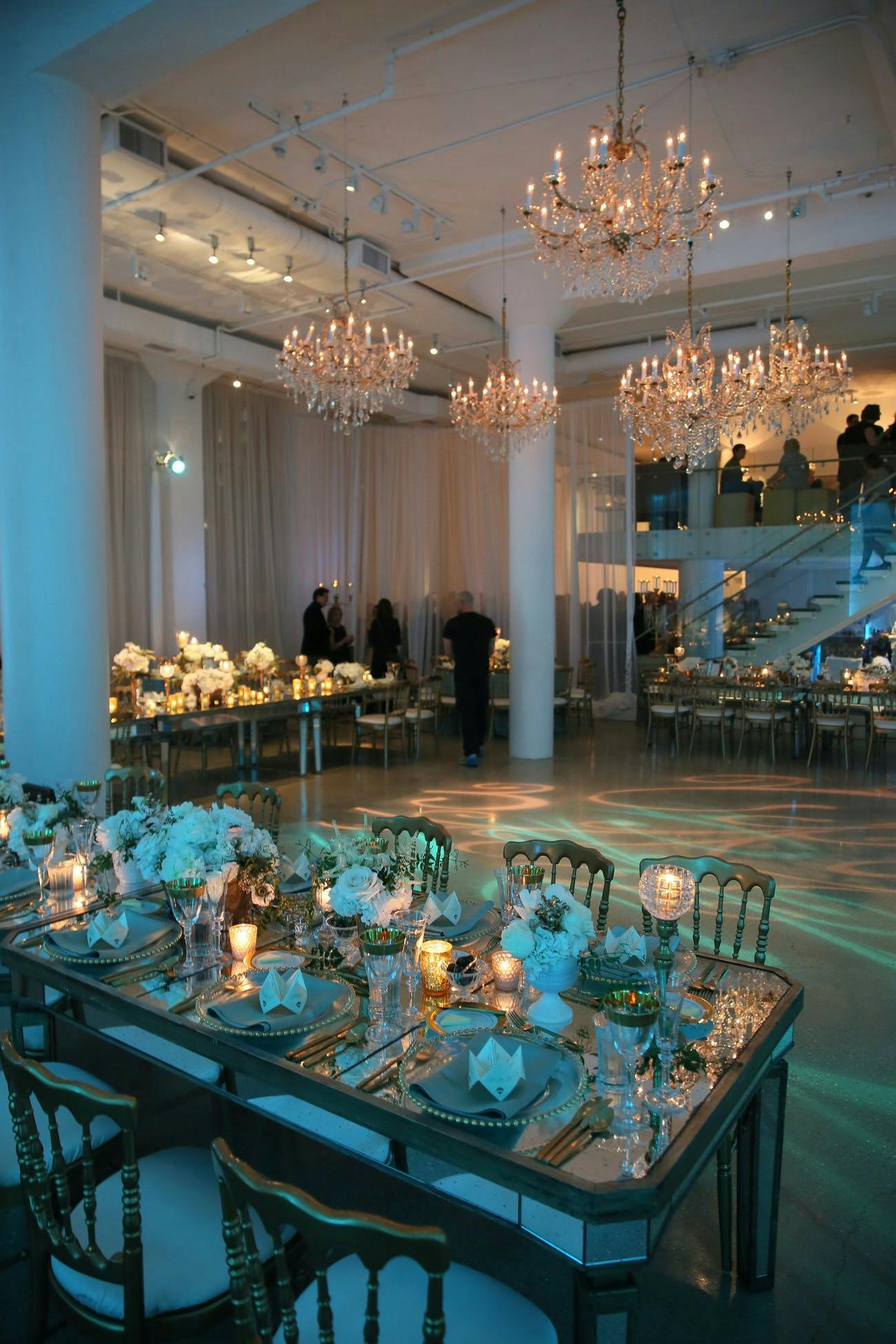 Beautiful Room with Glass Chandeliers and a Blue Hue