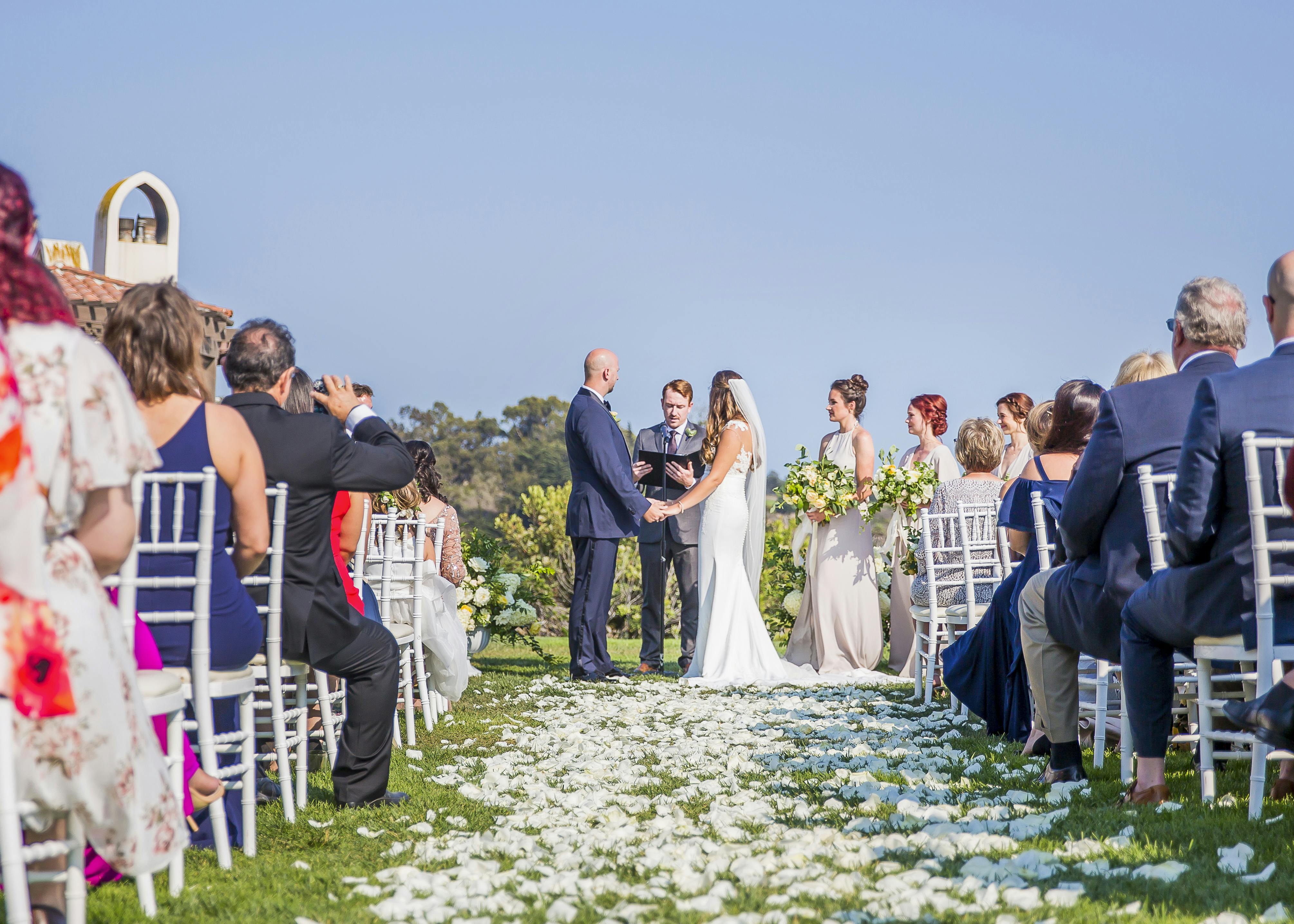 Romantic Oceanview Wedding at The Ritz-Carlton Bacara, Santa Barbara in Santa Barbara, CA With Petals for Wedding Aisle | PartySlate