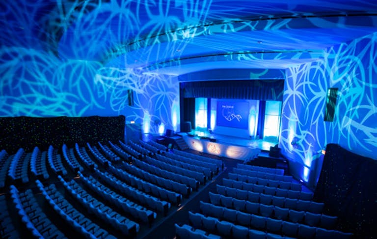 Auditorium at Museum of Science and Industry, Chicago with blue lighting | PartySlate