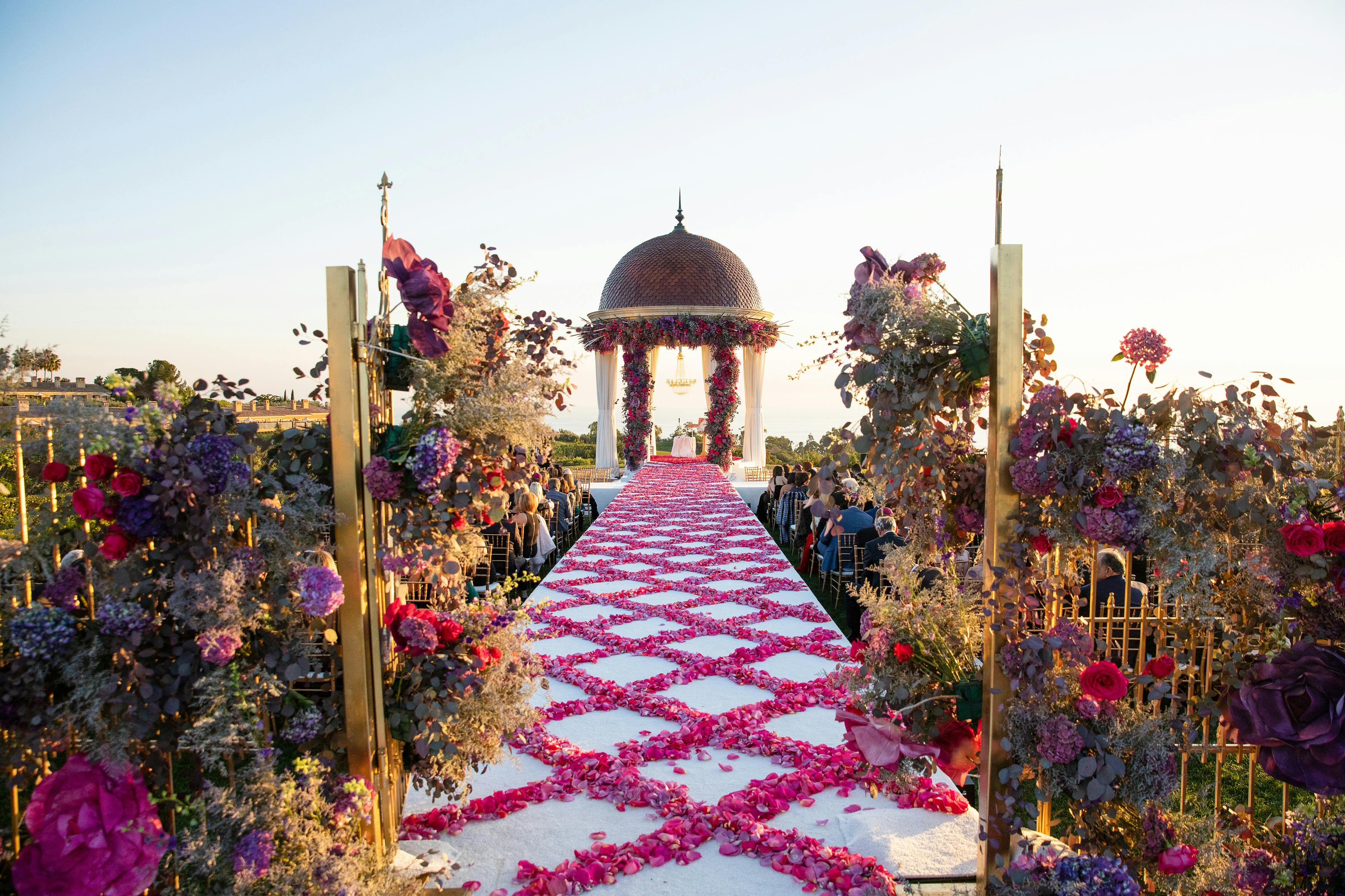Criss-Cross Rose Petal Wedding Aisle Décor at Pelican Hill Resort in Newport Beach, CA | PartySlate
