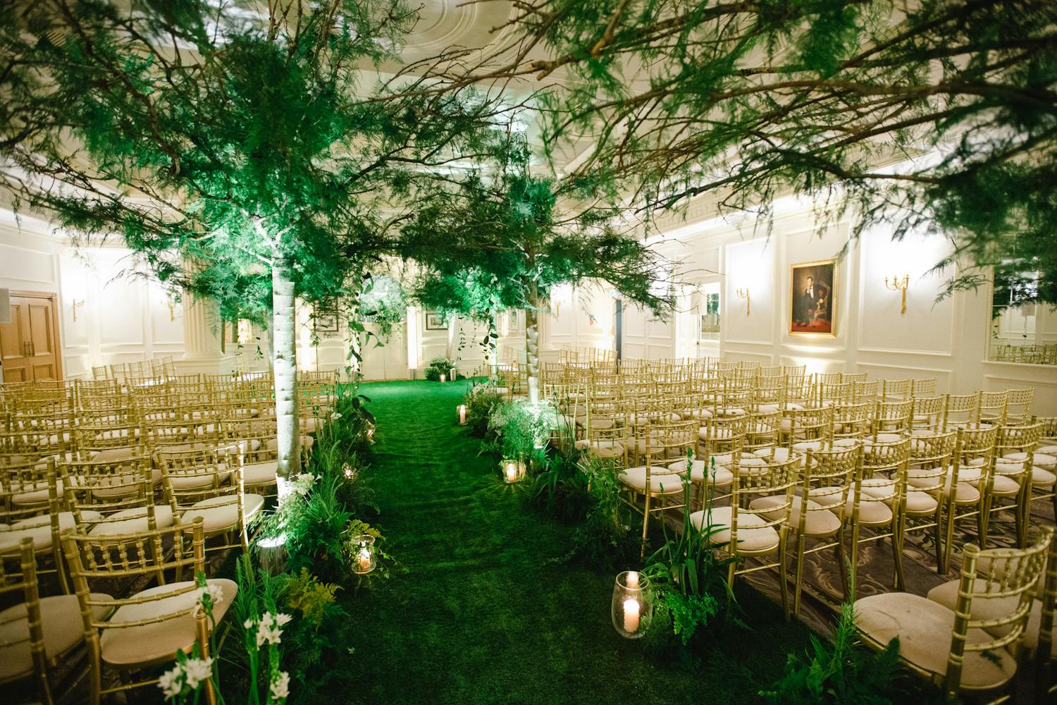An Enchanted Forest Inspired Wedding With Greenery Aisle Décor | PartySlate