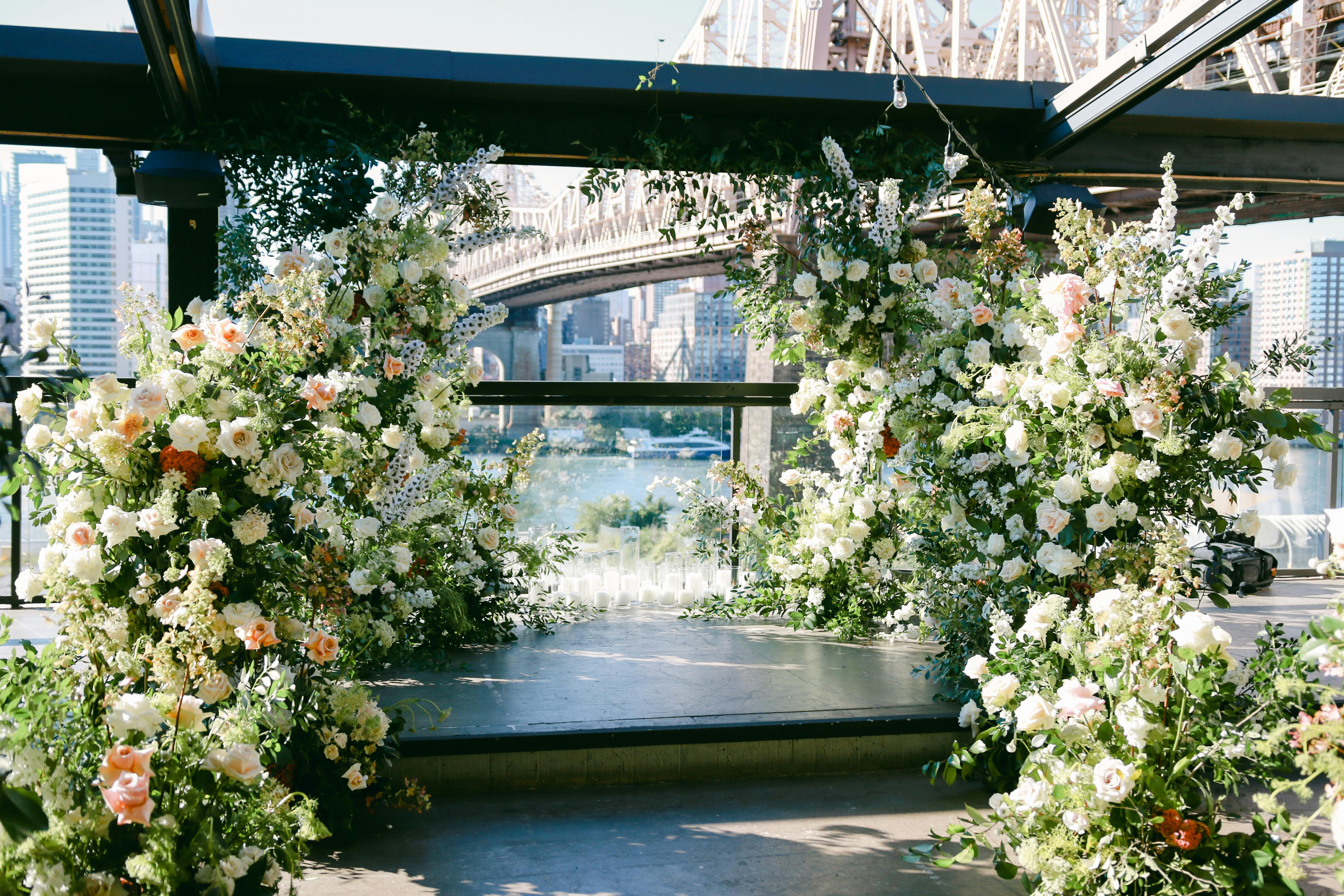Charming Floral Alter Decor For Wedding at The Ravel Hotel in Long Island City, New York | PartySlate