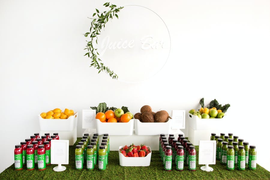 Geometric decor and orderly arrangements of food and drinks by flavor | PartySlate
