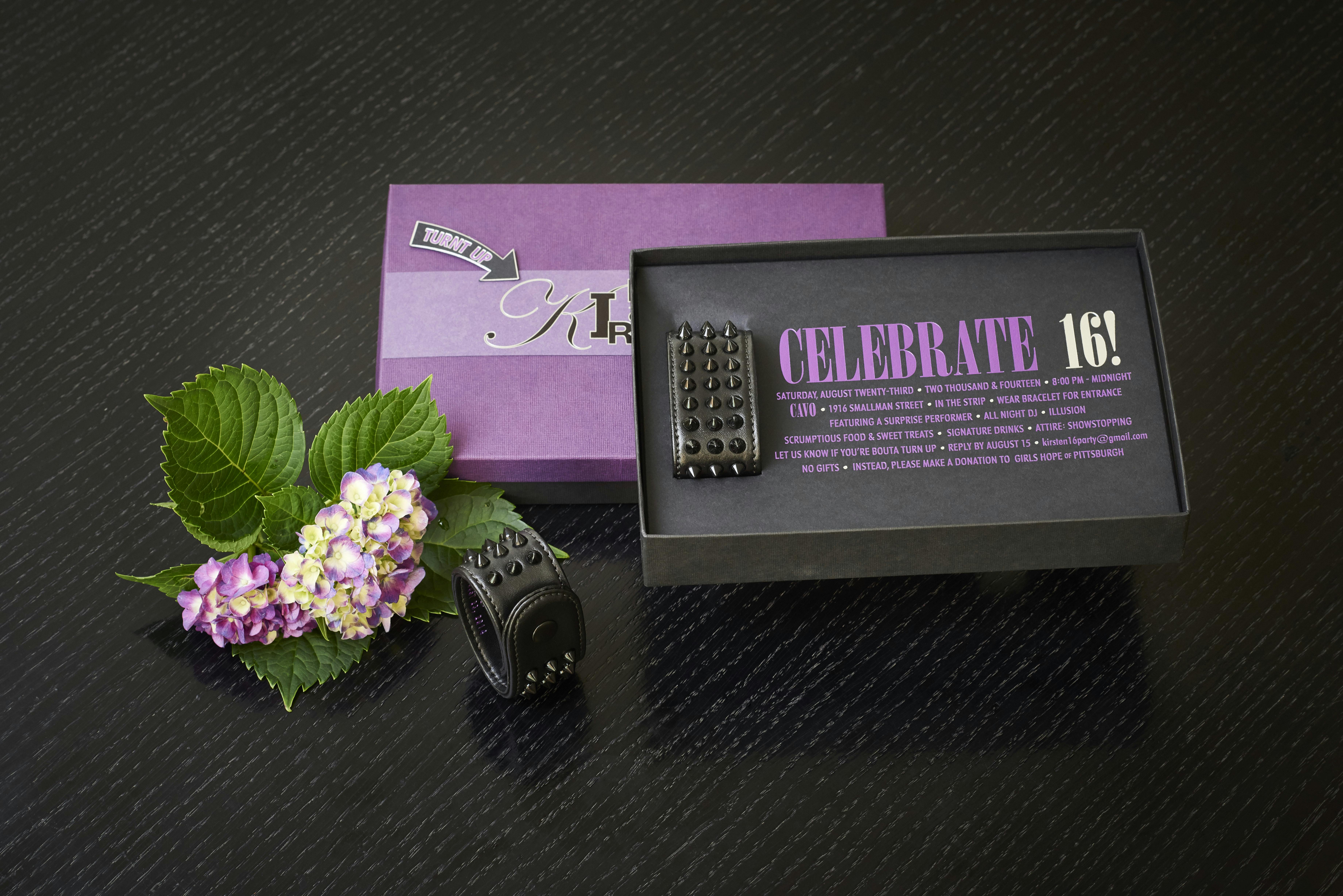 CreateStudio Design Sweet 16 Invitation Box in Purple and Black with Bracelet Included.