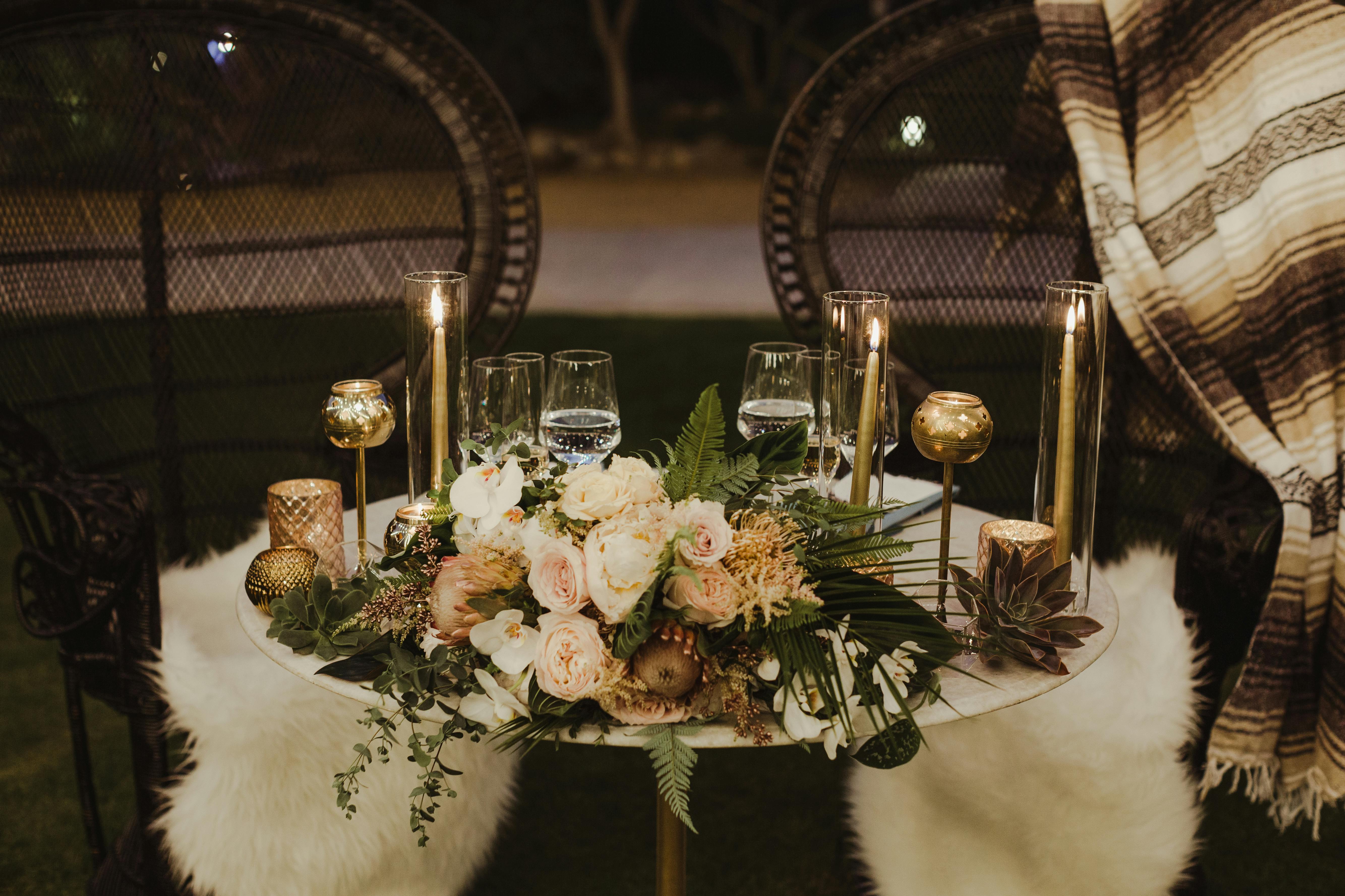 Elegant Desert Wedding at Colony 29 in Palm Springs, CA With Floral and Succulent Wedding Centerpieces and Candle Light.