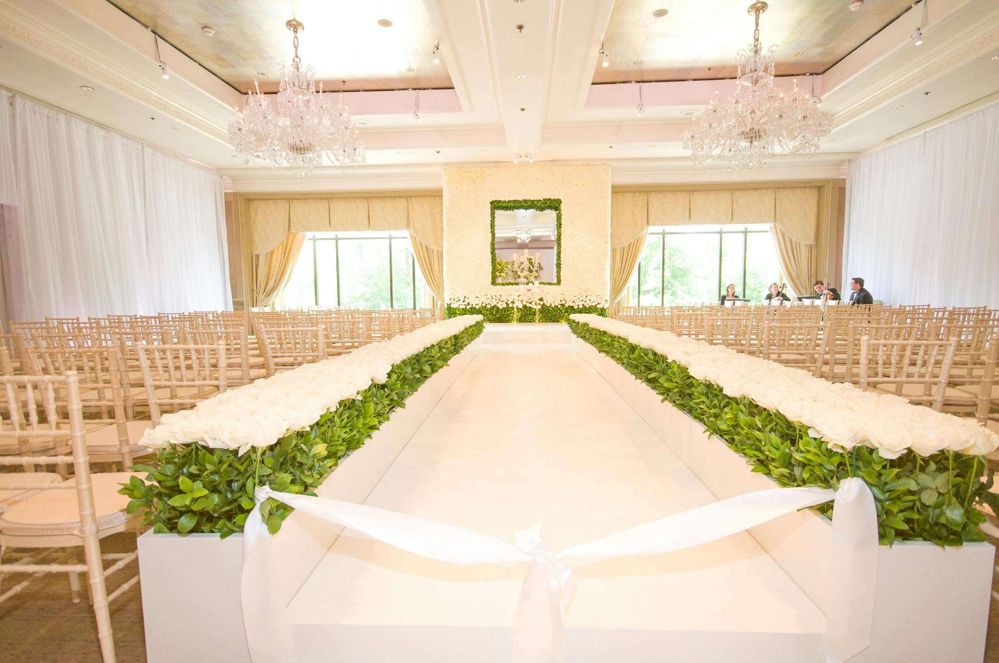 Lush White Wedding at Four Seasons Hotel Boston in Boston, MA With Green Wedding Aisle Décor | PartySlate
