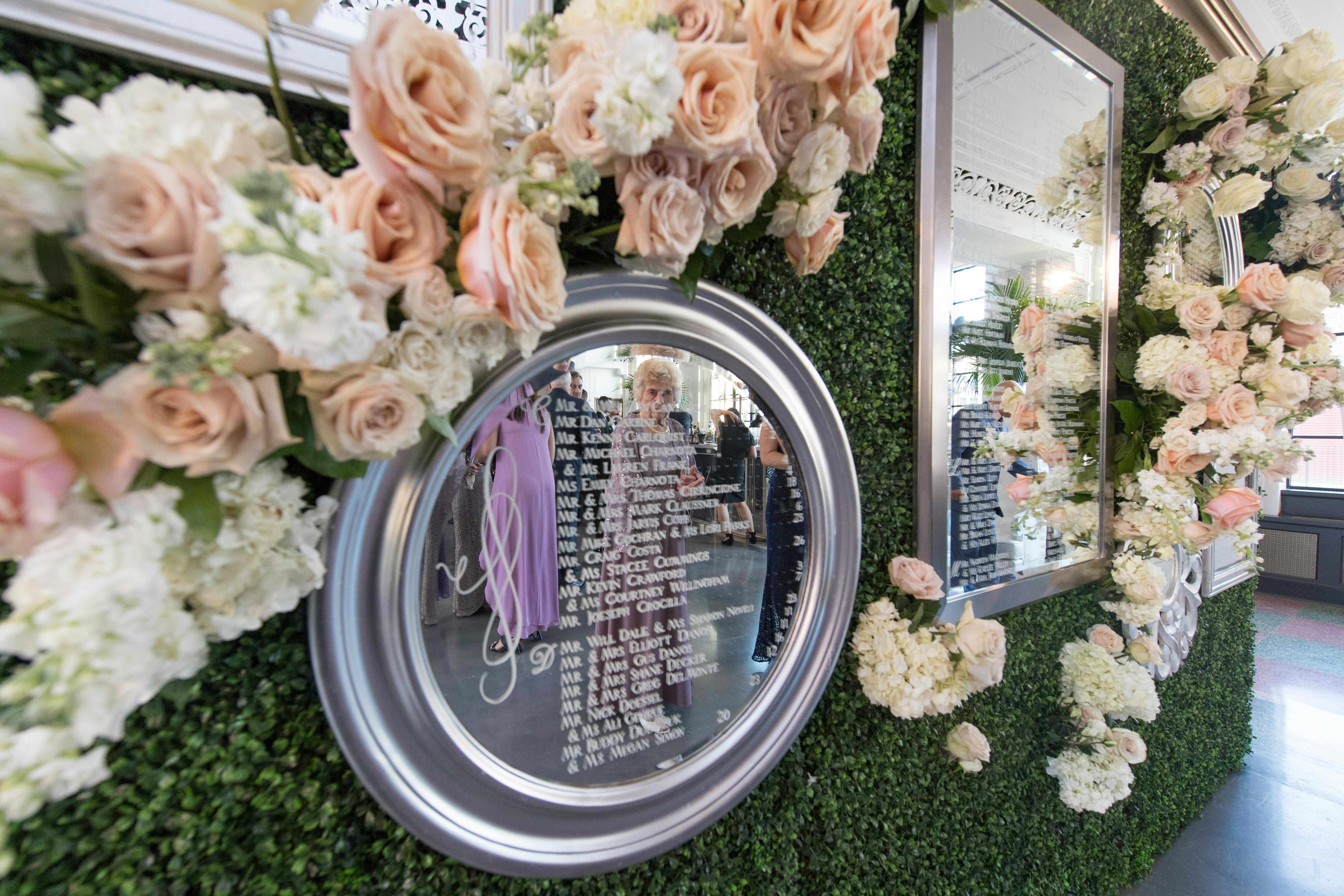 Modern Romance at Revel Motor Row With Boxwood and Mirrored Seating Chart