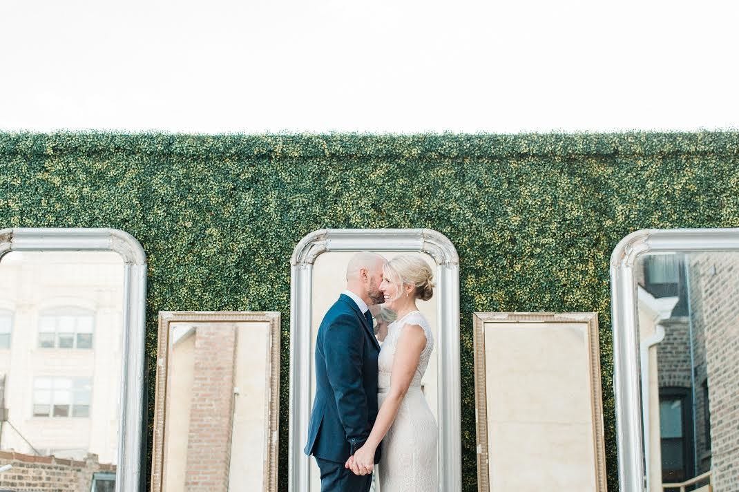 Wedding with Pastel Spring Wedding Colors and Boxwood Backdrop with Vintage Mirrors