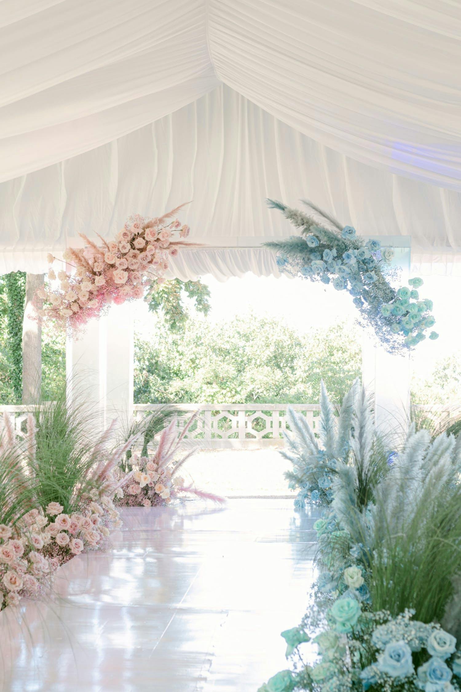 Ballerina pink and baby blue wedding reception florals trends 2021 | PartySlate