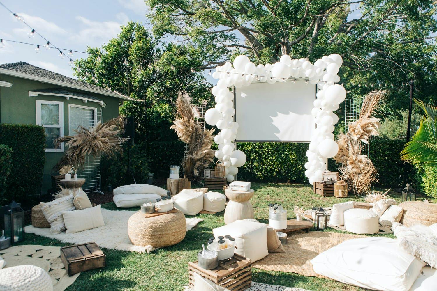 Backyard movie theater with a boho style | PartySlate