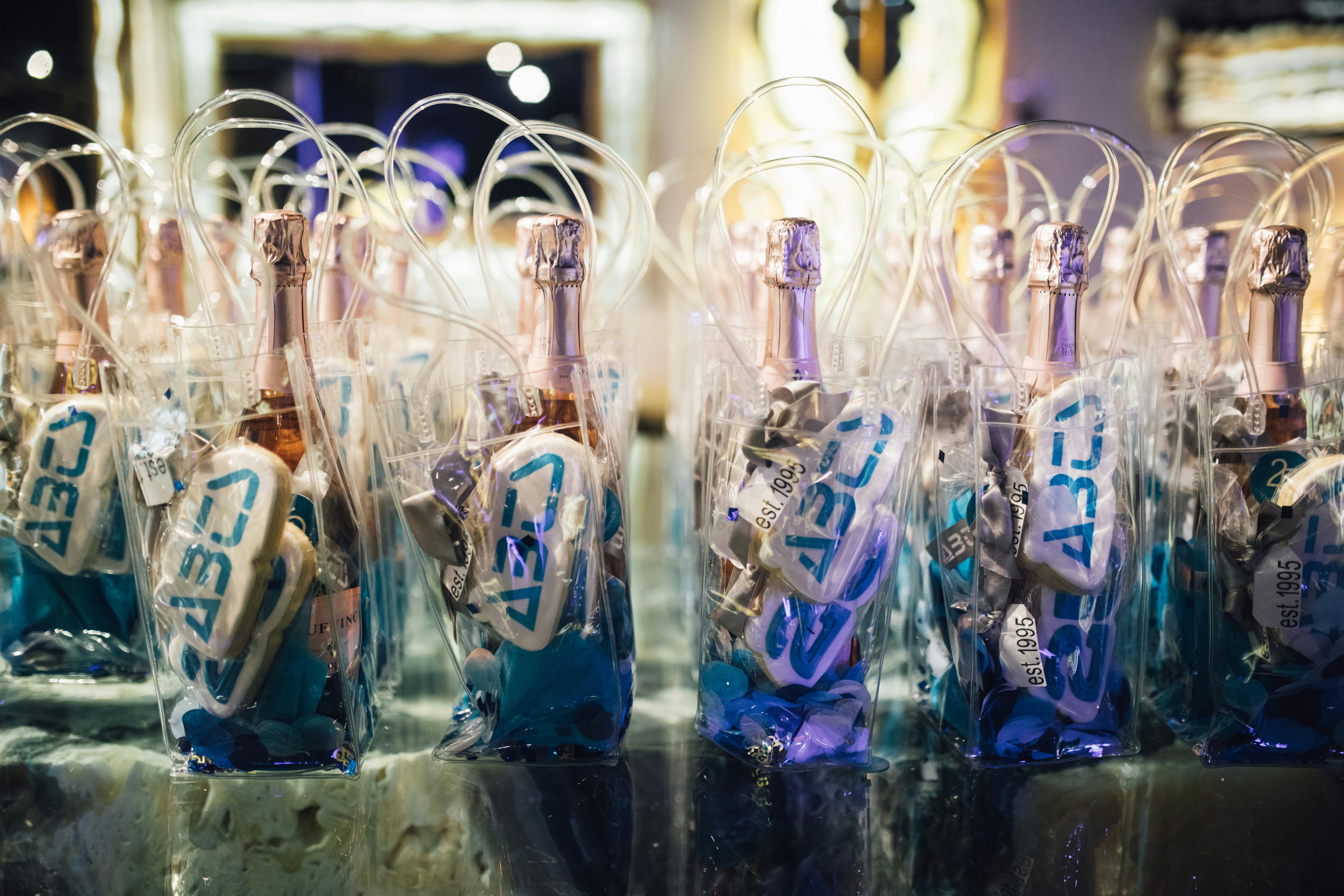 Corporate Anniversary Party With Mini Champagne Party Favors | PartySlate