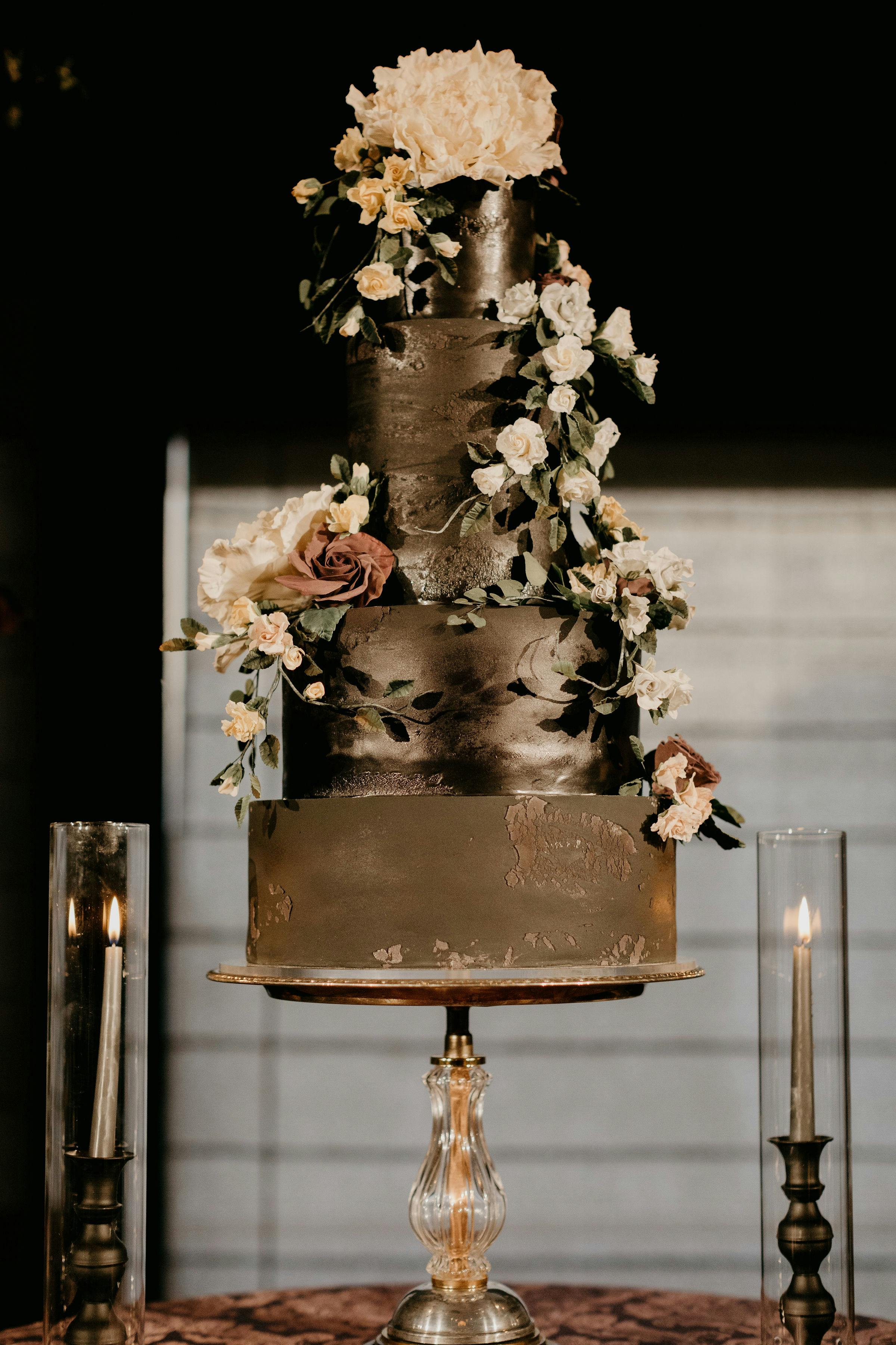 Black Wedding Cake at Luxurious Enchanting Wedding at The Asian Art Museum in San Francisco, CA | PartySlate