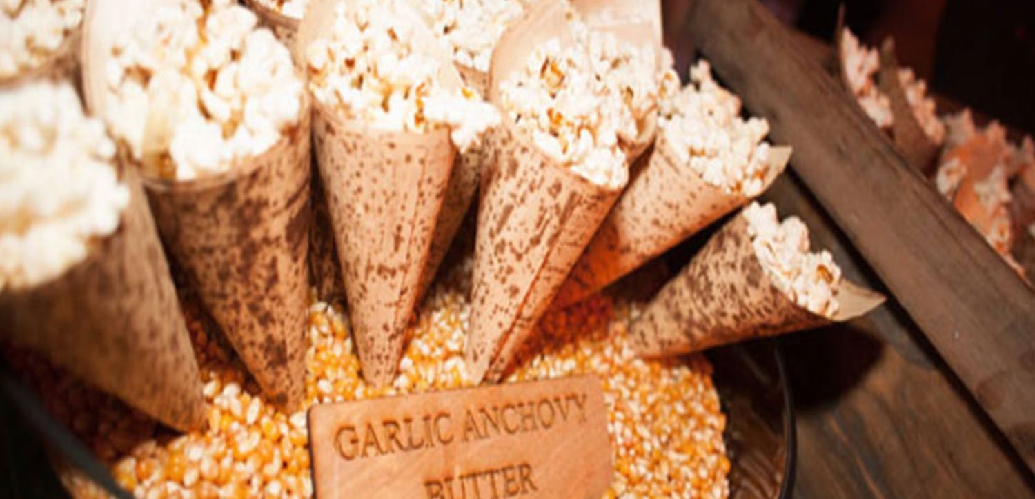 Savory Pop Corn in Paper Cone by Work of Art Catering | PartySlate