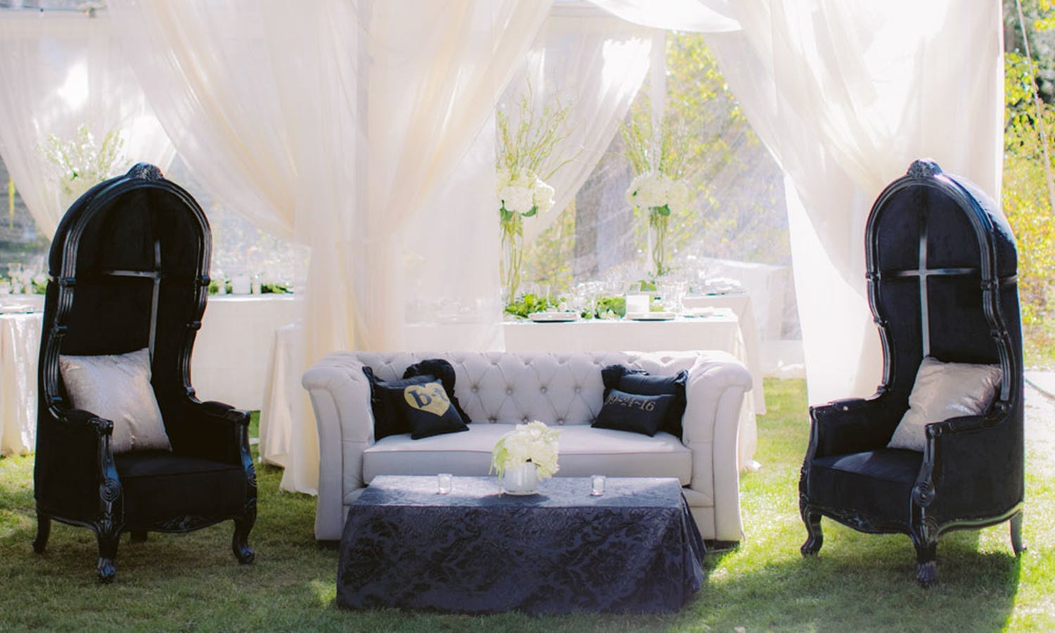Outdoor Wedding With Gothic Black and White Lounge Area and Ethereal White Tenting | PartySlate
