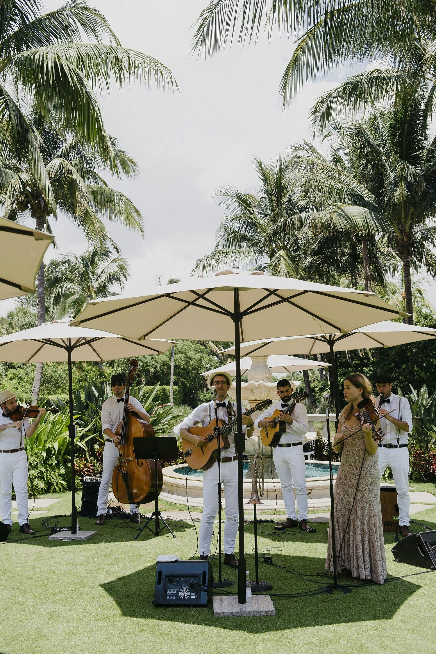 Entertainers performing at an outdoor beach event