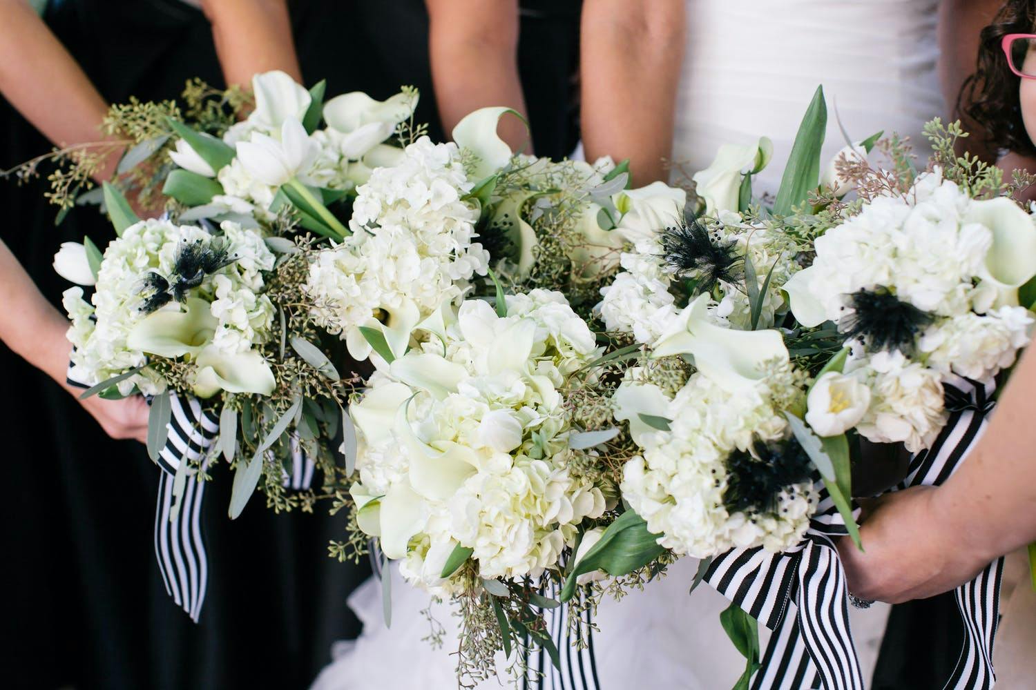 White Bridal Bouquets with Black and White Striped Ribbons | PartySlate