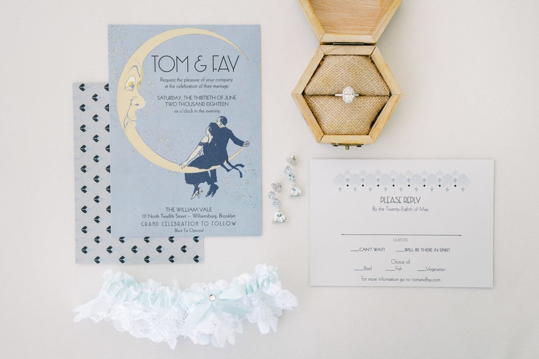 Light blue Gatsby themed wedding invitations | PartySlate