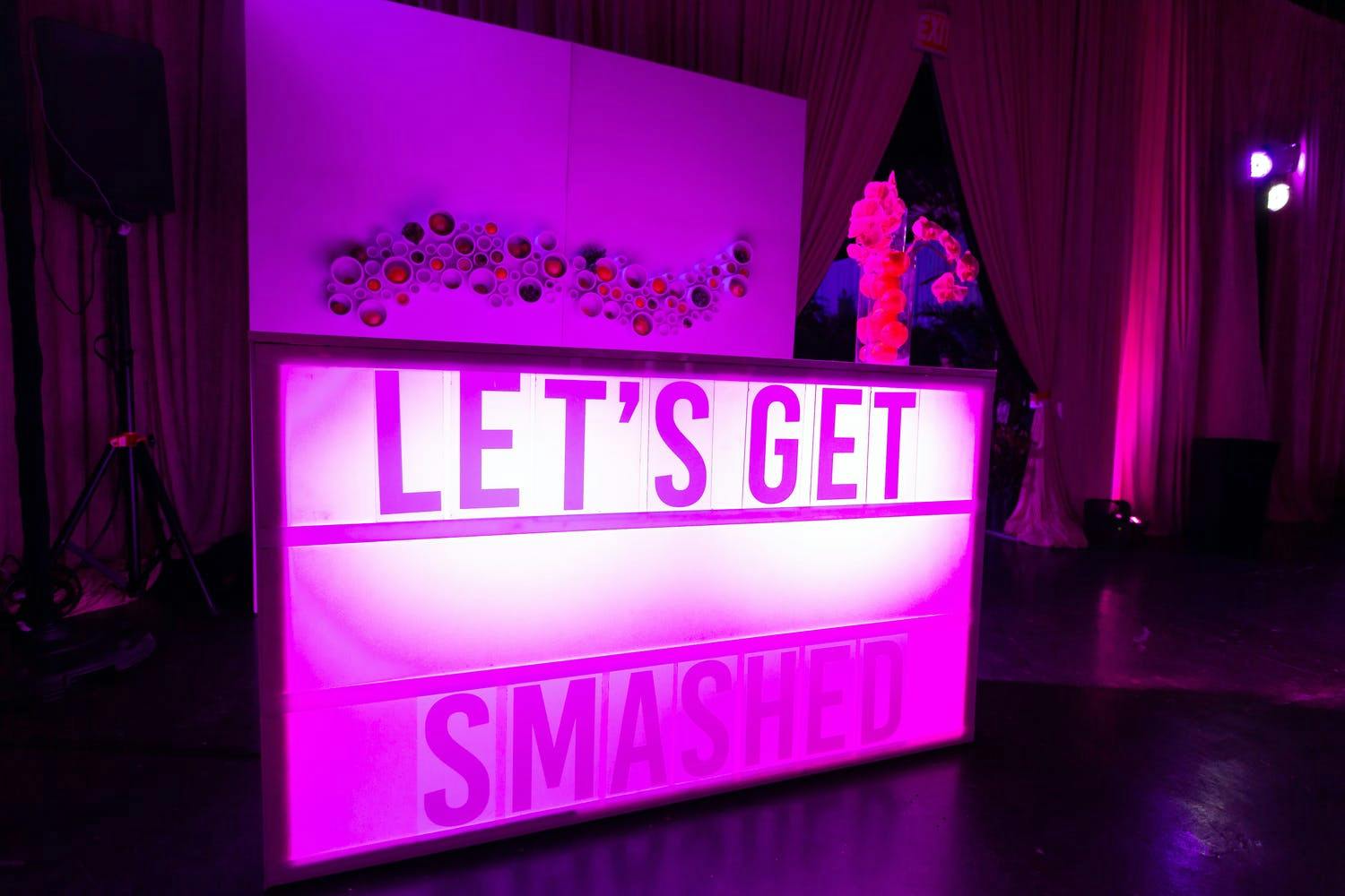 Neon Bar Area at Neon-Themed Anniversary Party | PartySlate