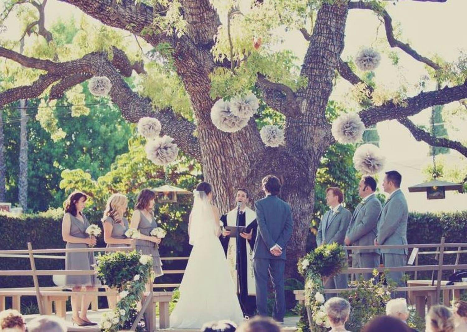 Wedding With Giant Tree Backdrop and Tissue Paper Pom Pom Décor | PartySlate