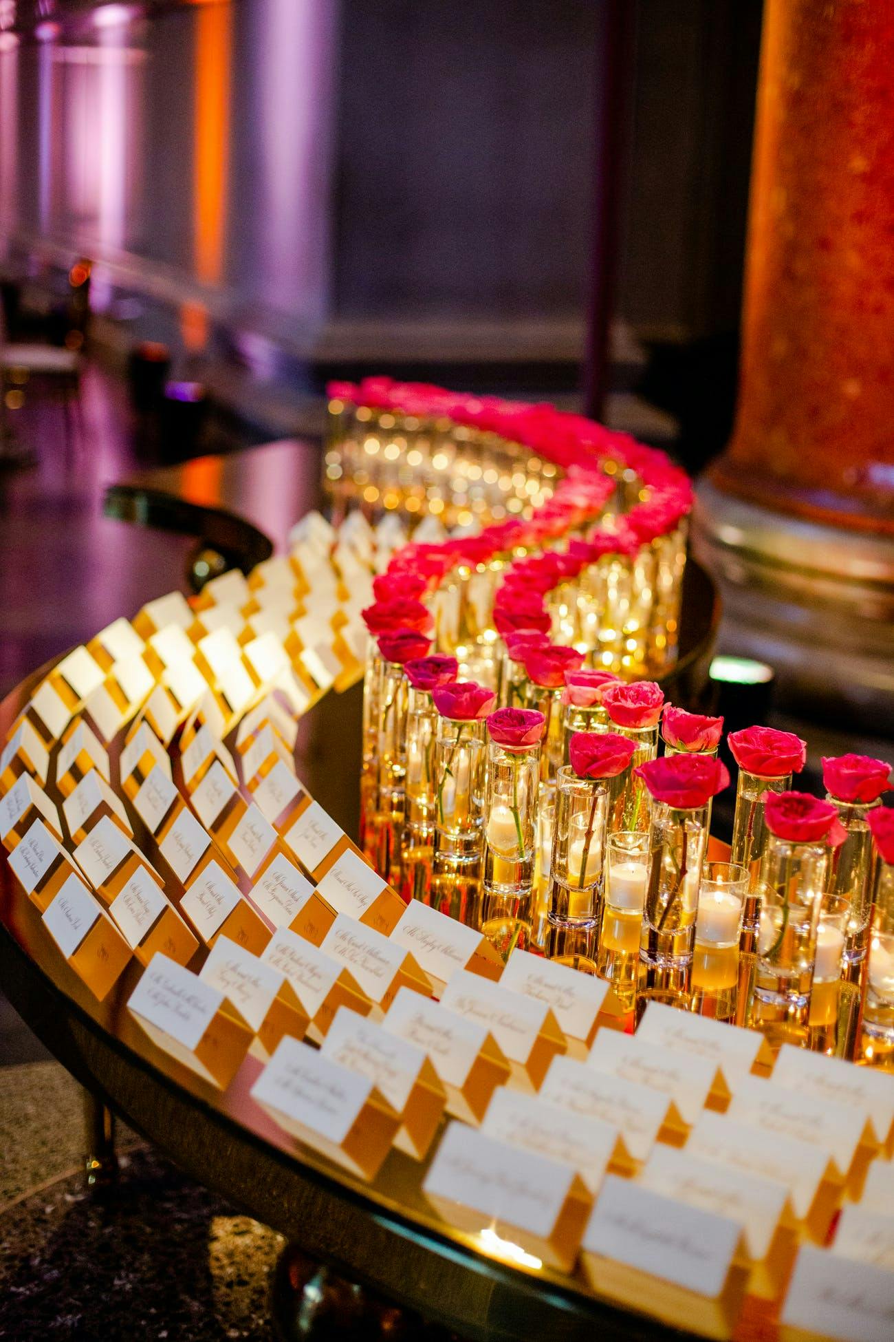 Gold and red seating display | PartySlate