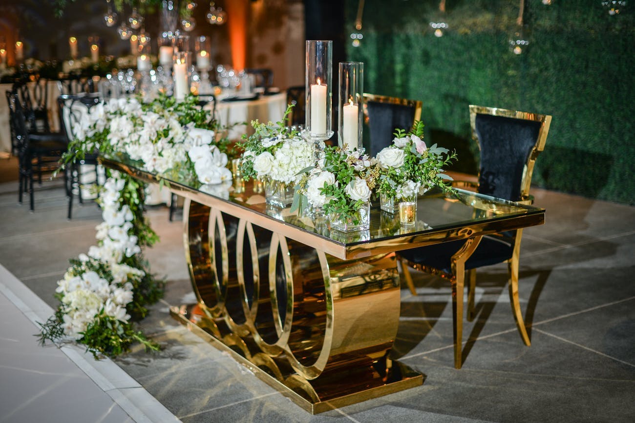 Black velvet and gold table for a modern wedding | PartySlate