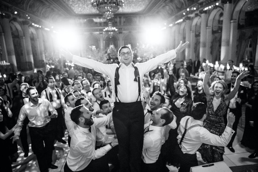 Man Falls Back Into Arms of Guests on the Dance Floor | PartySlate